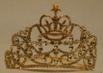 Amaranth rhinestone crown in gold tone with all white stones